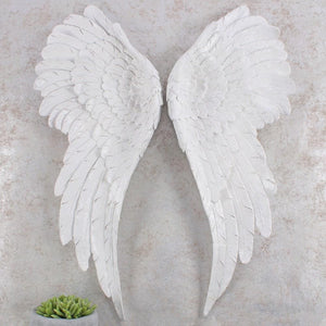 Angels have landed!  If you are looking for something spiritual or to remember a lost loved one then we have some beautiful Large Angel Wing wall hangings in White Glitter and Silver and some Angel Wing Tea Light Holders.