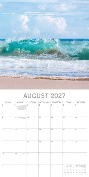 A vertical wall calendar page for August 2027, with a beach and ocean scene across the top and a white calendar grid below.