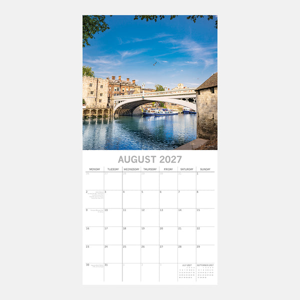 York Calendar page for August 2027 with a bridge over a river and blue sky.