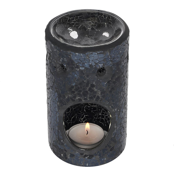 Decorative candle holder with a cracked glass top on a white background