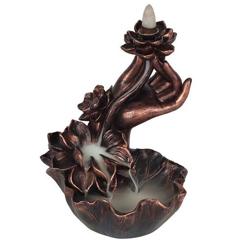 A bronze effect backflow incense burner designed as a hand holding a lotus flower with a smoke cascade coming from the top.