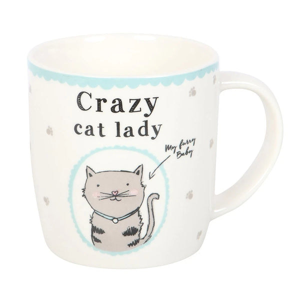 Crazy Cat Lady Mug

* White Mug.
* Presentation Box
* Size: 9cm x 8.7cm (Not including handle)
* Made by Something Different under the Jones Home &amp; Gift brand


This Crazy Cat Lady Mug Cup is a white ceramic round coffee mug featuring a novelty design with a cat character. It is perfect for cat lovers and can be used for tea, coffee, or other liquids. The mug includes a presentation box, making it a great gift for various occasions such as Easter, Christmas, birthdays, and more. It is microwave and dish