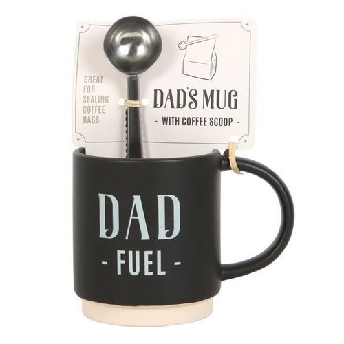 A black ceramic mug with 'DAD FUEL' text and a silver coffee scoop attached to it with a card reading 'DAD MUG WITH COFFEE SCOOP', indicating the product is a gift set for父亲's Day, birthdays, or Christmas.