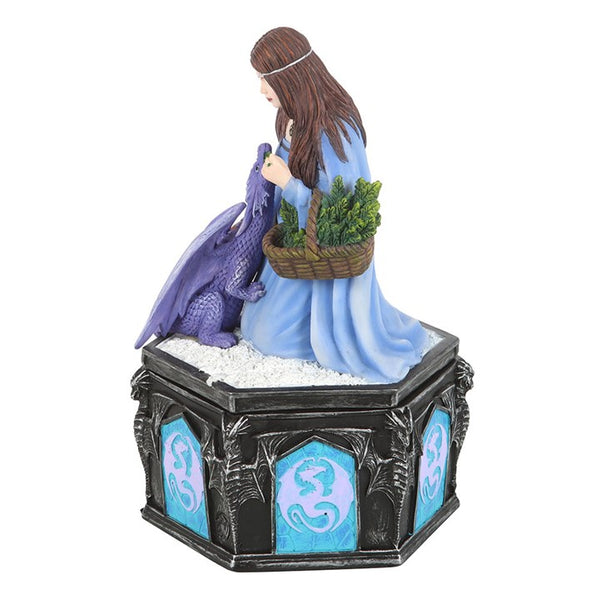 Decorative figurine of a woman with a dragon on a white background