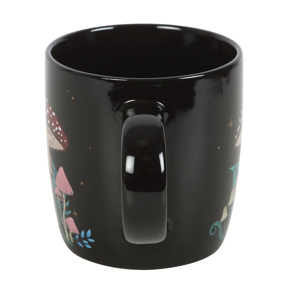 Forest Mushroom Mug

* Black Mug.
* Presentation Box
* Size: 9.3cm x 8.8cm (Not including handle)
* Made by Something Different under the Jones Home &amp; Gift brand


Start your day with a sip of serenity from this rounded mug featuring a magical forest mushroom print. Great for hot drinks on dreamy mornings or quiet evenings under the moonlight. 500ml capacity. Microwave safe. Dishwasher safe.

It is perfect for tea, coffee, or other liquids.

The mug includes a presentation box, making it a great gift fo
