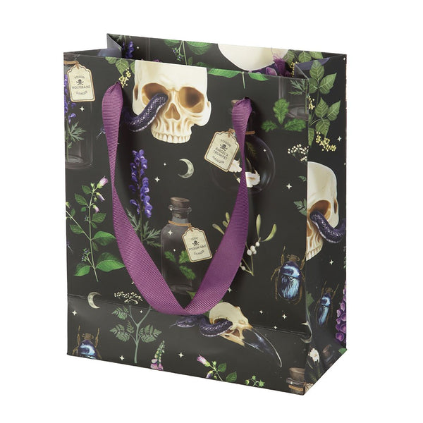Glossy gift bag with skull and potion design on a black background