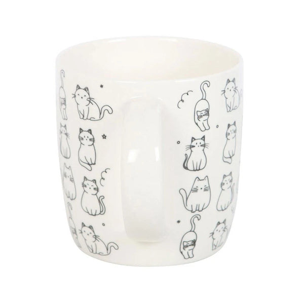 This White Happy Cat Mug is a charming ceramic cup featuring a novelty design of kittens, perfect for enjoying tea, coffee, or espresso.