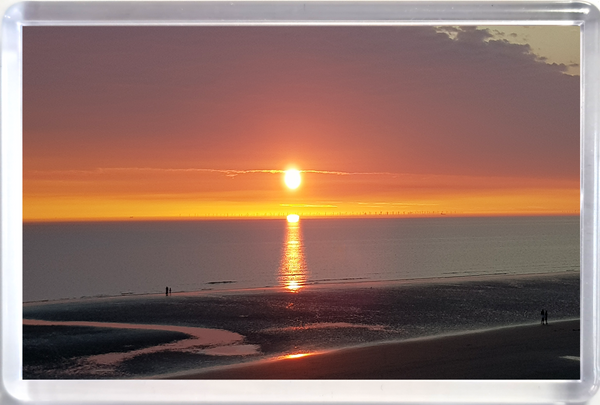 Jumbo Blackpool fridge magnet showing a beautiful sunset on the beach and sea.