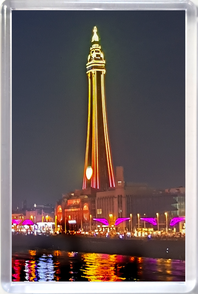 Jumbo Blackpool fridge magnet showing a yellow and orange Blackpool Tower and the Illuminations reflecting in the sea.