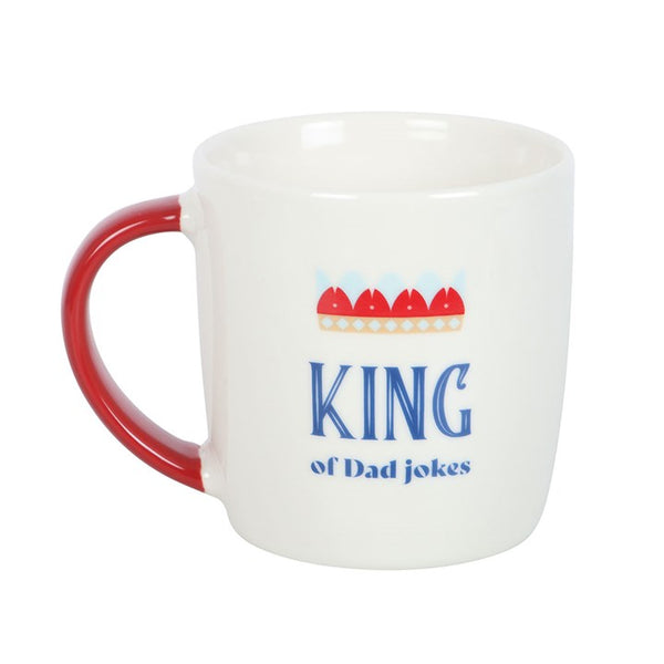 White mug with red handle and king of dad jokes text
