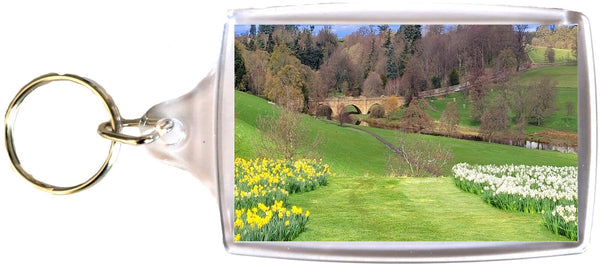 Large Alnwick Castle Keyring showing grounds in Spring with Daffodils and bridge