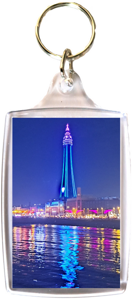 Large Blackpool Keyring showing a blue and pink Blackpool Tower and the Illuminations reflecting in the sea.