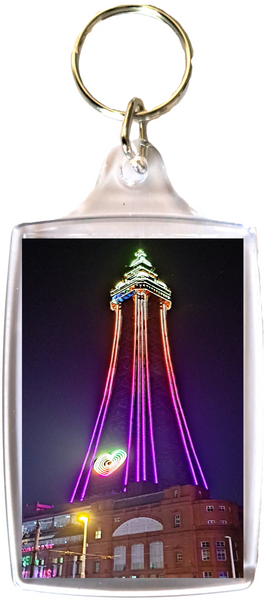 Large Blackpool Keyring showing a pink and purple  Blackpool Tower at night.