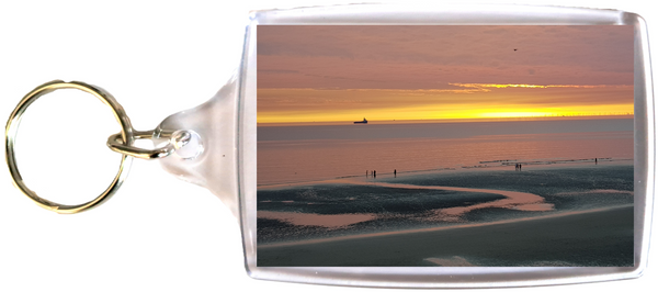 Large Blackpool Keyring showing a sunset on the beach and sea with a ship on the horizon