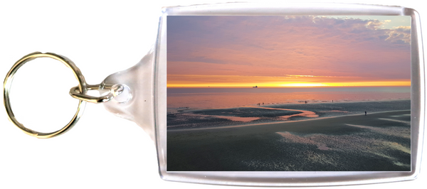 Large Blackpool Keyring showing a sunset on the beach and sea with a ship on the horizon