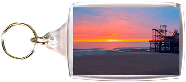 Large Blackpool Keyring showing a sunset on the beach and sea with pier.