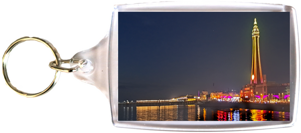 Large Blackpool Keyring showing a yellow and orange Blackpool Tower and the Illuminations reflecting in the sea.