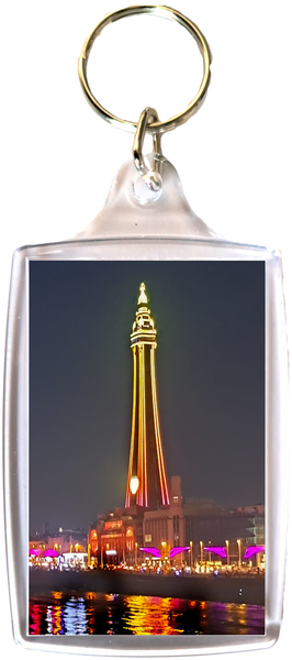 Large Blackpool Keyring showing a yellow and orange Blackpool Tower and the Illuminations reflecting in the sea.