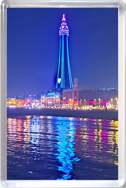 Large Blackpool fridge magnet showing a blue and pink Blackpool Tower and the Illuminations reflecting in the sea.