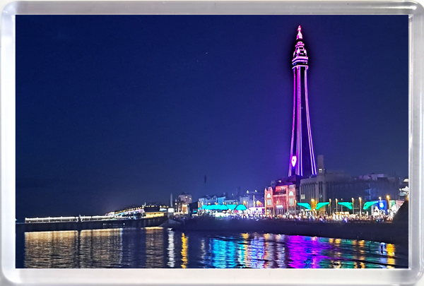 Large Blackpool fridge magnet showing a purple Blackpool Tower and the Illuminations reflecting in the sea.