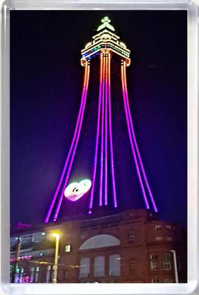 Large Blackpool fridge magnet showing a  purple  Blackpool Tower at night.