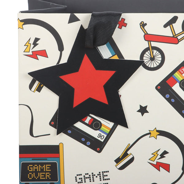 Product packaging with a red star and cassette tape design on a patterned background