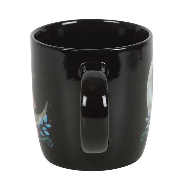 Mystical Moon &amp; Mushroom Mug

* Black Mug.
* Presentation Box
* Size: 9.4cm x 8.9cm (Not including handle)
* Made by Something Different under the Jones Home &amp; Gift brand


Start your day with a sip of serenity from this rounded mug featuring a mystical moon and mushroom print. Great for hot drinks on dreamy mornings or quiet evenings under the moonlight. 500ml capacity. Microwave safe. Dishwasher safe.

It is perfect for tea, coffee, or other liquids.

The mug includes a presentation box, making it