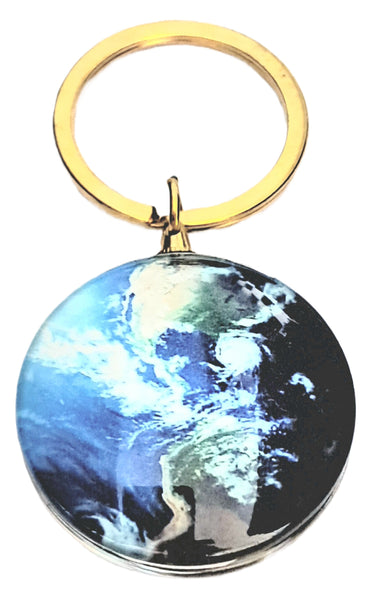 Planet Earth Keyring with a circular design featuring North and South America, attached to a gold ring.