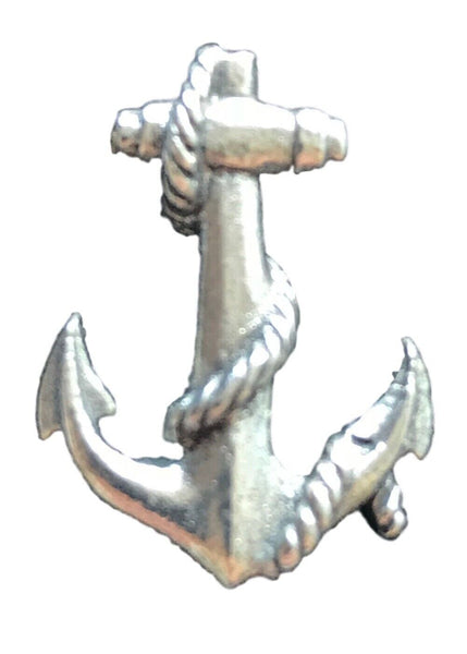 A pewter pin badge in the shape of a ships anchor.