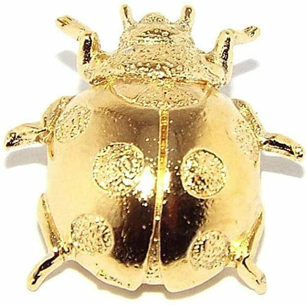 Gold plated pewter ladybird badge with a butterfly clip, approximately 2cm x 2cm in size.